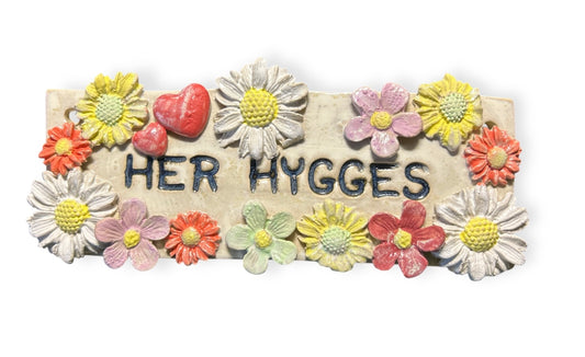 Her hygges skiltet