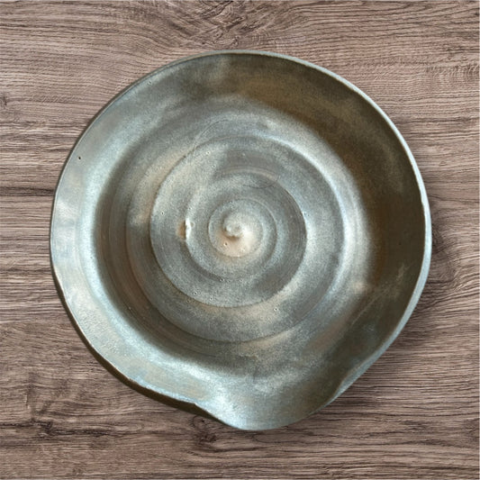 Grydeske holder vinterblå