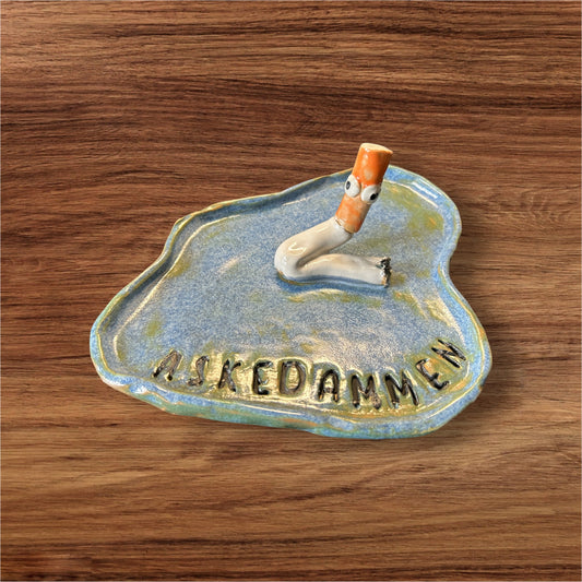 Askedammen